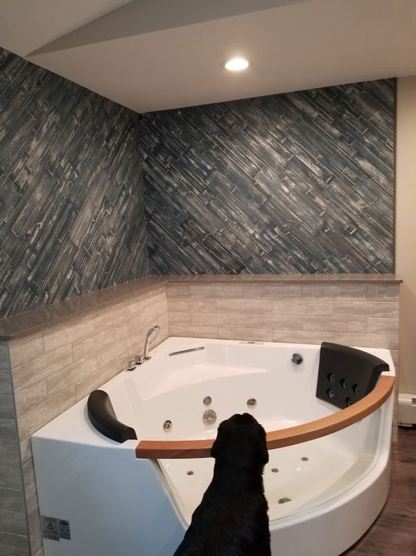 tiled tub surround in bathroom